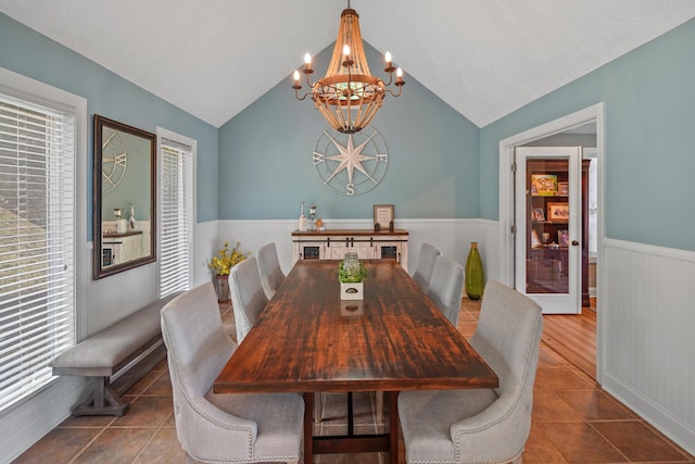 800 Long Island Dr, Moneta, VA 24121 - dining area with a chandelier, wainscoting, lofted ceiling, and tile patterned flooring