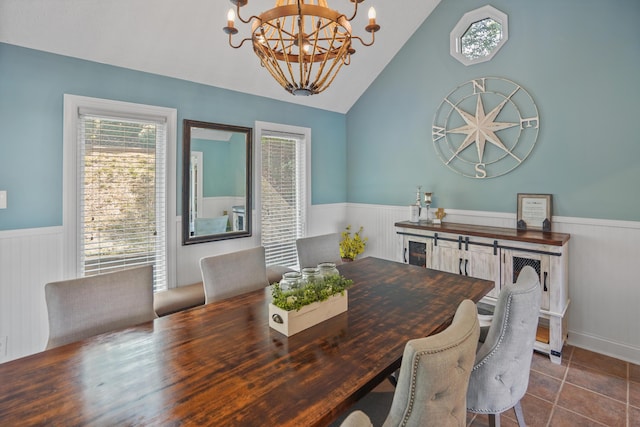 800 Long Island Dr, Moneta, VA 24121 - dining space with wainscoting, a chandelier, lofted ceiling, and tile patterned floors