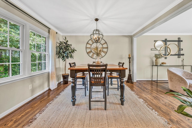 134 Sawyer Dr, Salem, VA 24153 - dining area featuring wood finished floors, crown molding, and a chandelier