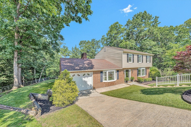 134 Sawyer Dr, Salem, VA 24153 - colonial inspired home with brick siding, a garage, driveway, and a chimney