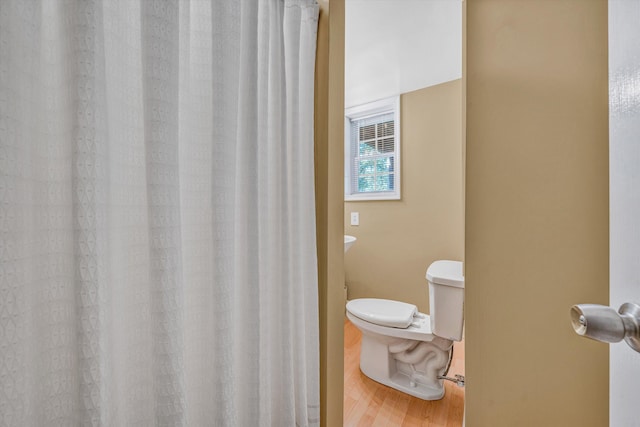 134 Sawyer Dr, Salem, VA 24153 - bathroom featuring wood finished floors and curtained shower