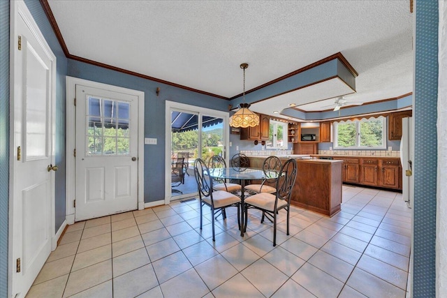 5880 Sugar Loaf Mountain Rd, Roanoke, VA 24018 - dining room featuring crown molding, a textured ceiling, healthy amount of natural light, and light tile patterned floors