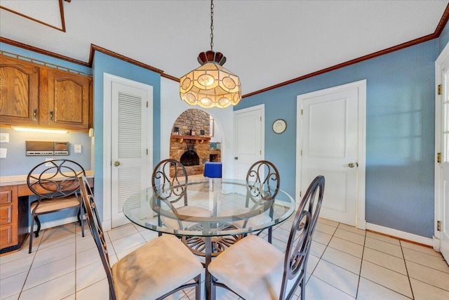 5880 Sugar Loaf Mountain Rd, Roanoke, VA 24018 - dining area with crown molding, light tile patterned floors, and arched walkways