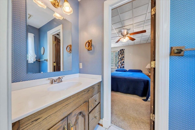 5880 Sugar Loaf Mountain Rd, Roanoke, VA 24018 - ensuite bathroom featuring wallpapered walls, vanity, and a ceiling fan