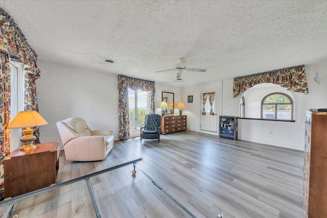 5880 Sugar Loaf Mountain Rd, Roanoke, VA 24018 - living area featuring a textured ceiling, wood finished floors, and ceiling fan