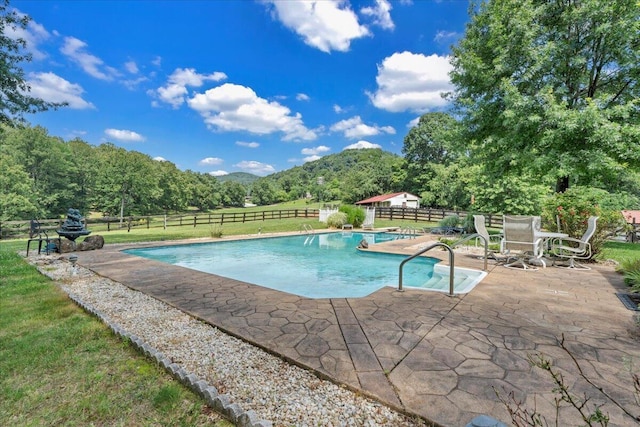 5880 Sugar Loaf Mountain Rd, Roanoke, VA 24018 - outdoor pool featuring a patio area, a fenced backyard, and a mountain view