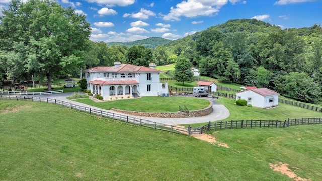 5880 Sugar Loaf Mountain Rd, Roanoke, VA 24018 - rear view of property featuring an outdoor structure, a chimney, a view of trees, and a view of countryside