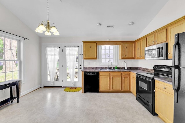 1524 19th St NE, Roanoke, VA 24012 - kitchen with black appliances, vaulted ceiling, a chandelier, healthy amount of natural light, and decorative light fixtures