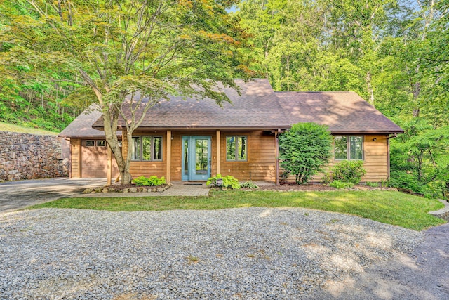8757 Bent Mountain Rd, Roanoke, VA 24018 - view of front facade featuring driveway, an attached garage, and roof with shingles