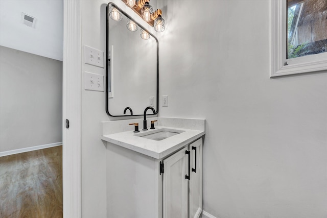 8757 Bent Mountain Rd, Roanoke, VA 24018 - bathroom with vanity and wood finished floors