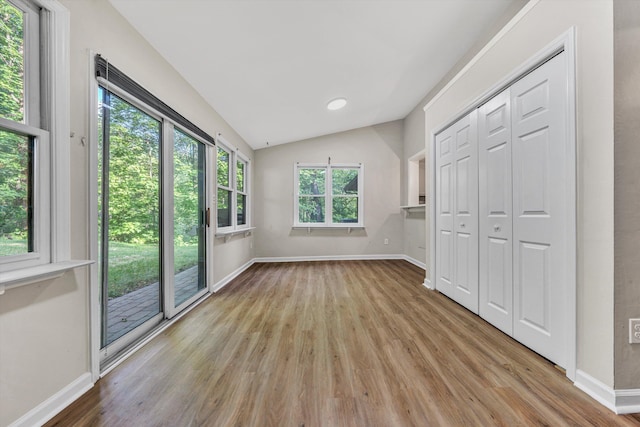 8757 Bent Mountain Rd, Roanoke, VA 24018 - unfurnished bedroom with wood finished floors, vaulted ceiling, a closet, and recessed lighting