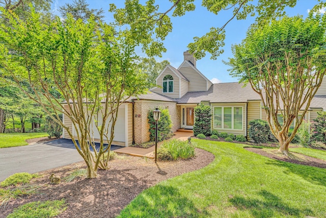 30 Island Green Cir Unit 22, Penhook, VA 24137 - view of front of home featuring asphalt driveway, a front yard, and an attached garage