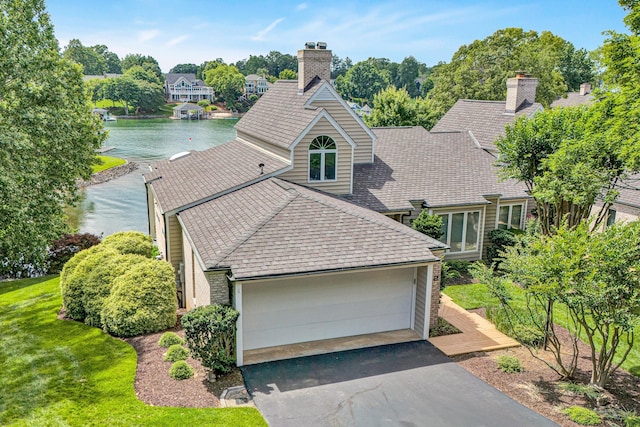 30 Island Green Cir Unit 22, Penhook, VA 24137 - view of front facade with a chimney, a water view, and a shingled roof