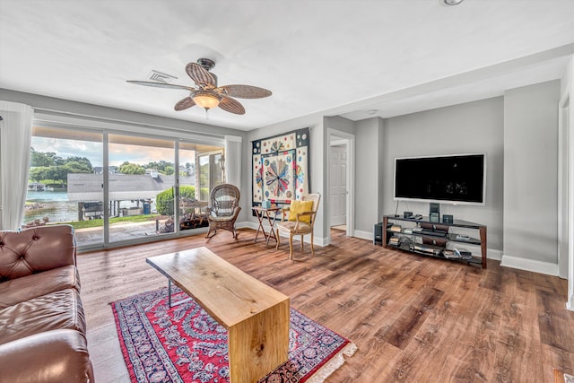 30 Island Green Cir Unit 22, Penhook, VA 24137 - living area with ceiling fan and wood finished floors