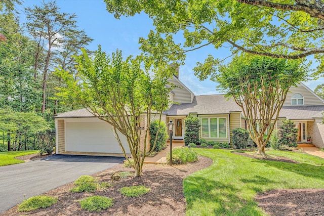 30 Island Green Cir Unit 22, Penhook, VA 24137 - view of front of house featuring a front lawn, driveway, a shingled roof, and a garage