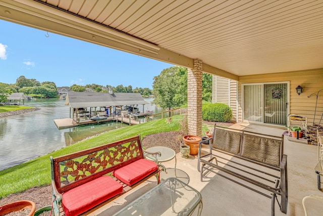 30 Island Green Cir Unit 22, Penhook, VA 24137 - view of patio / terrace with a water view and a boat dock
