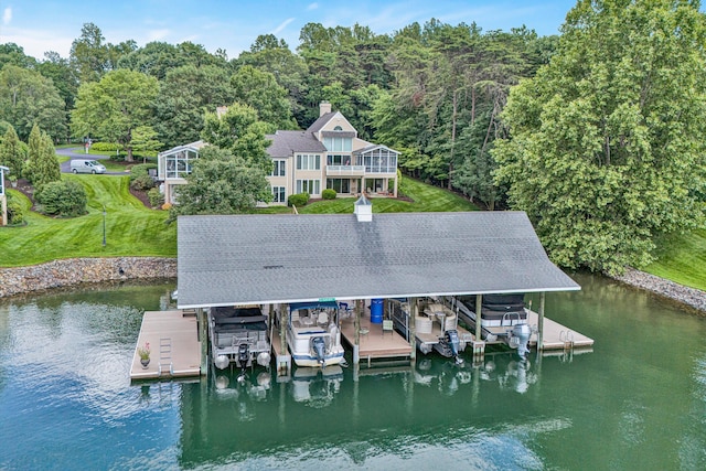 30 Island Green Cir Unit 22, Penhook, VA 24137 - dock area with boat lift, a water view, and a yard