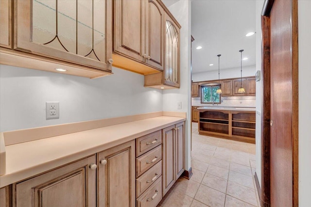 723 Fox Chase Rd, Wirtz, VA 24184 - kitchen featuring glass insert cabinets, light countertops, recessed lighting, light tile patterned floors, and pendant lighting