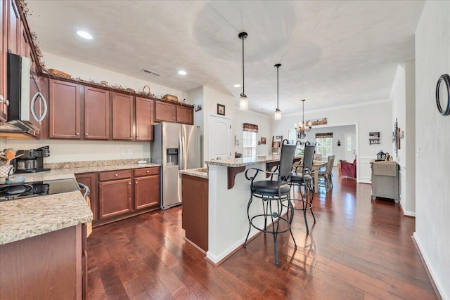 8355 Leighburn Dr, Roanoke, VA 24019 - kitchen featuring stainless steel appliances, a breakfast bar, a kitchen island, dark wood-type flooring, and recessed lighting
