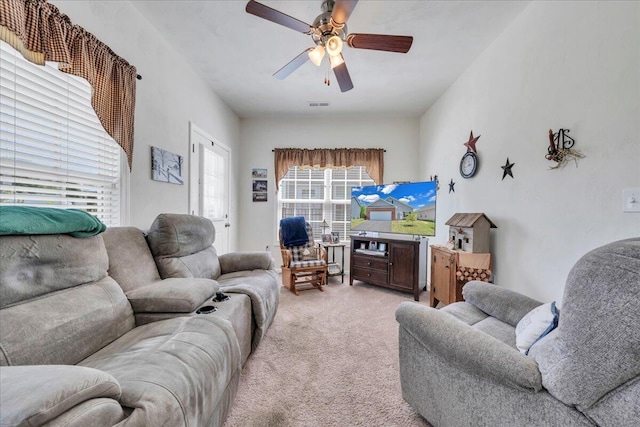 8355 Leighburn Dr, Roanoke, VA 24019 - living room featuring light colored carpet and a ceiling fan