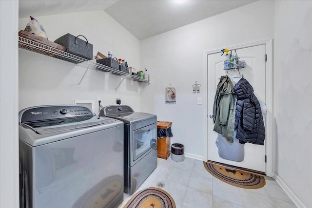8355 Leighburn Dr, Roanoke, VA 24019 - washroom featuring separate washer and dryer and light tile patterned flooring