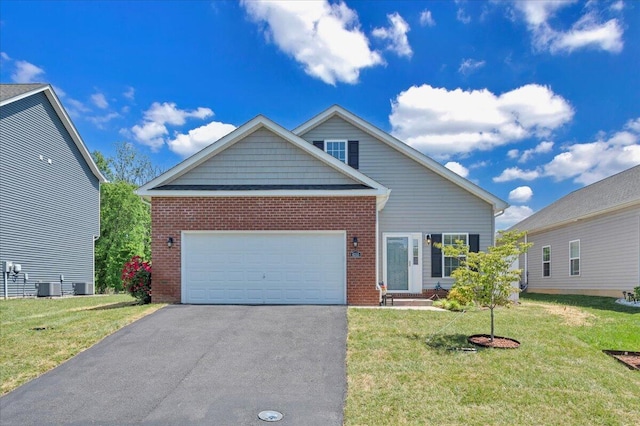 8355 Leighburn Dr, Roanoke, VA 24019 - traditional-style home featuring brick siding, driveway, and a front lawn
