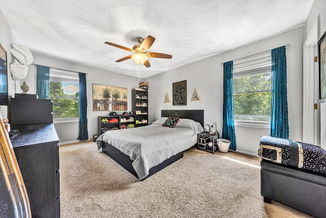 2343 Circle Dr SW, Roanoke, VA 24018 - carpeted bedroom featuring a ceiling fan and baseboards