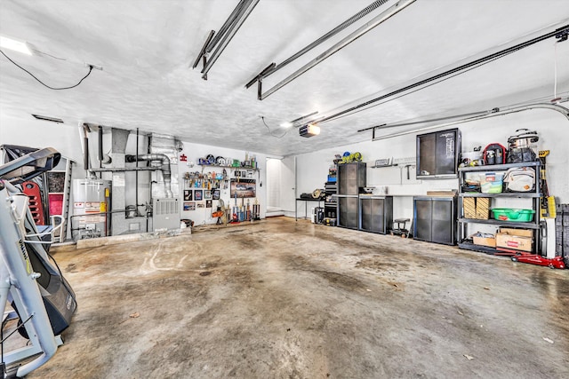 2343 Circle Dr SW, Roanoke, VA 24018 - garage with gas water heater and a garage door opener