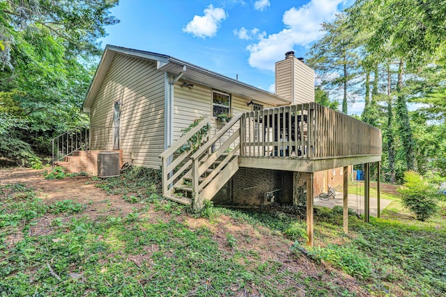 2343 Circle Dr SW, Roanoke, VA 24018 - view of side of home featuring stairway, a deck, and a chimney