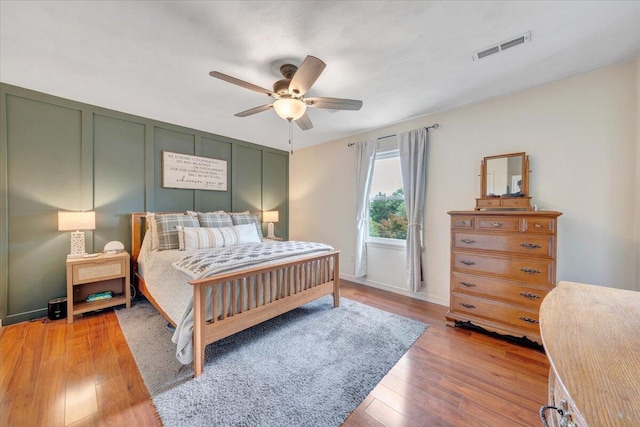 245 Queen Regent Ct, Blue Ridge, VA 24064 - bedroom with light wood-style floors and a ceiling fan