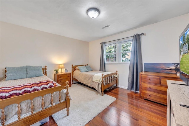 245 Queen Regent Ct, Blue Ridge, VA 24064 - bedroom featuring hardwood / wood-style flooring and baseboards