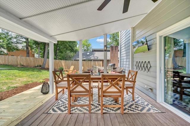 245 Queen Regent Ct, Blue Ridge, VA 24064 - wooden deck with a fenced backyard, outdoor dining space, and a ceiling fan