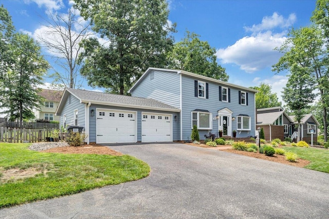 245 Queen Regent Ct, Blue Ridge, VA 24064 - colonial-style house featuring an attached garage and asphalt driveway