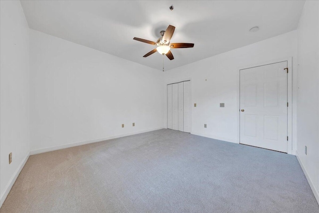3040 Mcvitty Forest Dr Unit 211, Roanoke, VA 24018 - unfurnished bedroom featuring carpet, a ceiling fan, and a closet
