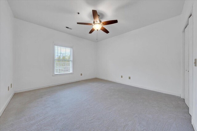 3040 Mcvitty Forest Dr Unit 211, Roanoke, VA 24018 - empty room featuring a ceiling fan and light carpet