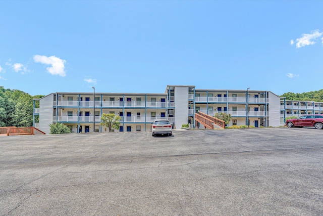 1085 Bluewater Dr Unit 220, Moneta, VA 24121 - view of apartment building / complex featuring uncovered parking