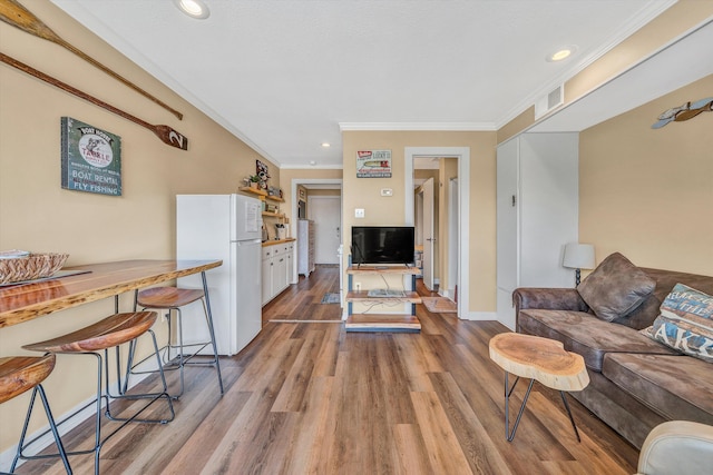 1085 Bluewater Dr Unit 220, Moneta, VA 24121 - living area with ornamental molding, wood finished floors, and recessed lighting