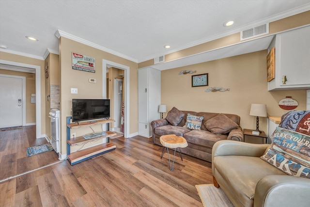 1085 Bluewater Dr Unit 220, Moneta, VA 24121 - living room with wood finished floors, ornamental molding, and recessed lighting