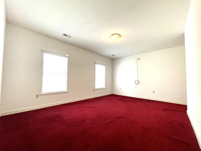 4845 Glen Ivy Ln SW Unit 209, Roanoke, VA 24018 - spare room featuring baseboards and dark carpet
