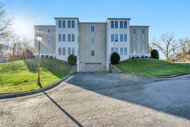 4845 Glen Ivy Ln SW Unit 209, Roanoke, VA 24018 - view of property with a garage and asphalt driveway