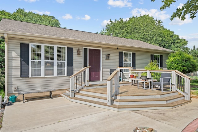 73 Bounty Ct, Roanoke, VA 24019 - ranch-style house with a wooden deck and a shingled roof