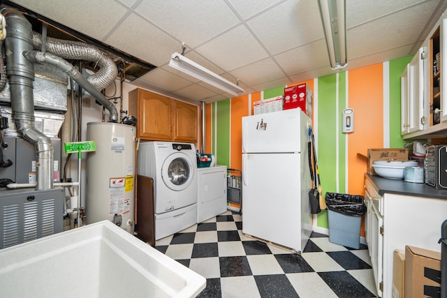 73 Bounty Ct, Roanoke, VA 24019 - laundry room featuring cabinet space, water heater, light flooring, and independent washer and dryer