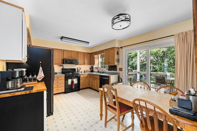 73 Bounty Ct, Roanoke, VA 24019 - kitchen featuring black appliances, plenty of natural light, and wood counters