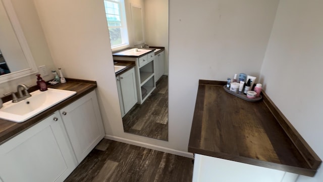 1148 Chapel View Ln, Goodview, VA 24095 - bar with a sink and dark wood finished floors