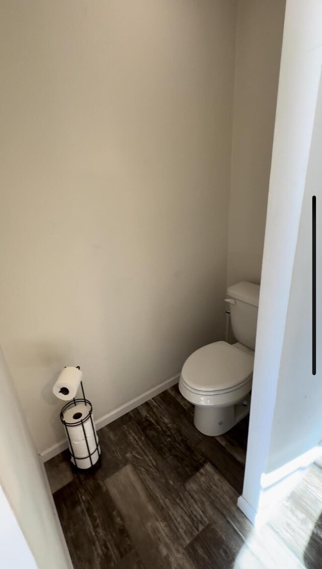 1148 Chapel View Ln, Goodview, VA 24095 - bathroom with wood finished floors and toilet