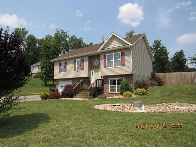 5605 Prunty Dr, Salem, VA 24153 - split foyer home with a garage, brick siding, and driveway