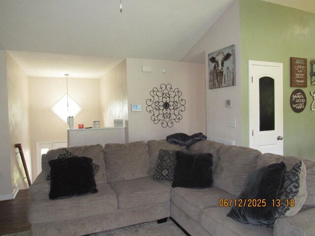 5605 Prunty Dr, Salem, VA 24153 - living area featuring vaulted ceiling and wood finished floors