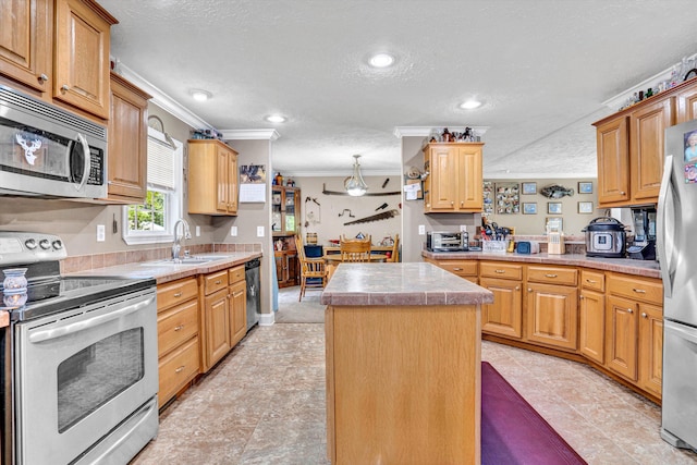 1060 Marble Creek Ct, Lynch Station, VA 24571 - kitchen featuring stainless steel appliances, ornamental molding, a textured ceiling, a kitchen island, and light countertops
