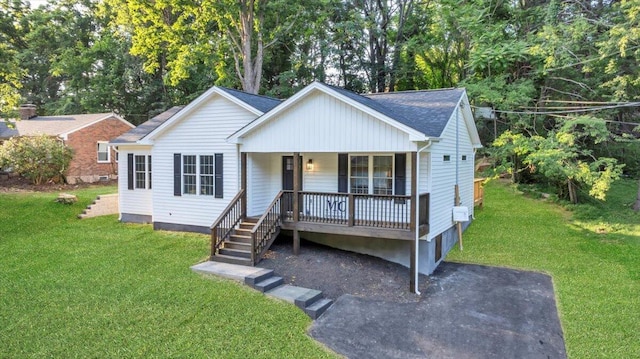 3713 Pinevale Rd, Roanoke, VA 24018 - view of front of property featuring covered porch, a front lawn, stairway, a shingled roof, and view of scattered trees