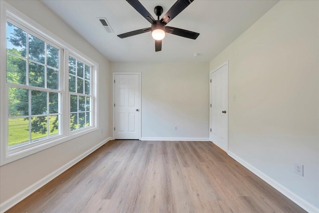 3713 Pinevale Rd, Roanoke, VA 24018 - unfurnished room with wood finished floors and ceiling fan